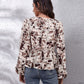 Ruched Printed V-Neck Long Sleeve Blouse