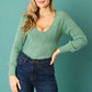 green long sleeve top