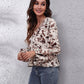 Ruched Printed V-Neck Long Sleeve Blouse